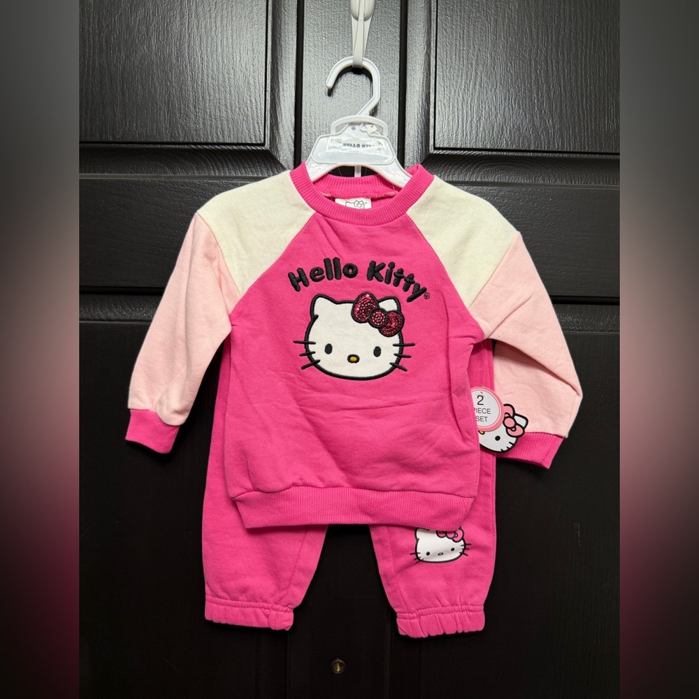 Girls Pink Hello Kitty 2pc Outfit 
New with tags
MSRP $32